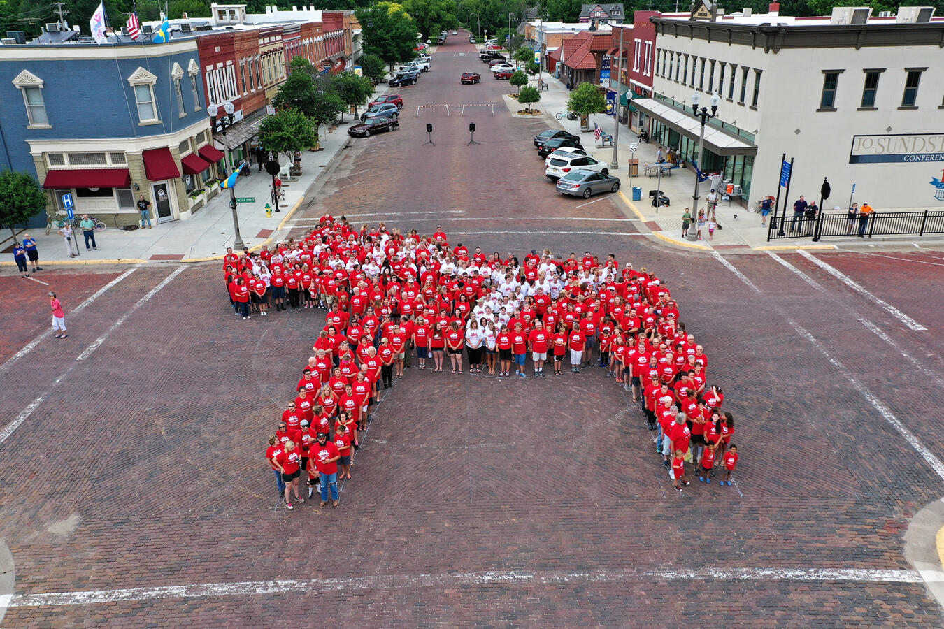 lindsborg-kansas-living-dala-community-photo A group of people arranged to form the shape of a large red Dala horse during a community event in Lindsborg.